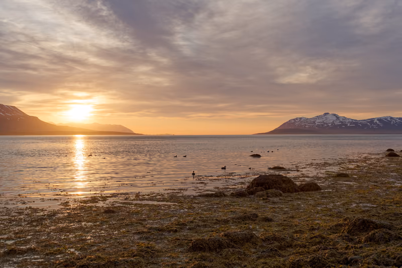 The sun low over Eyjafjörður at 10:35 in the evening
